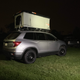By the time we showed up, we needed flashlights to set up and photograph the tent. David’s Jeep lurks in the background.